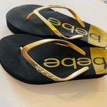 Bebe  sandals black and gold for women Photo 1