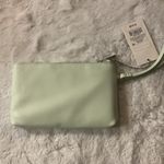 A New Day   Light Green Wristlet
Clutch | Color: Green I... Photo 1