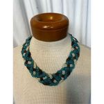 Singe medallion necklace and braided beaded necklaces Photo 1