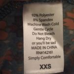 LuLaRoe Carly leggings material travelcore XXS high low dress Photo 1