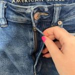 American Eagle  mom jeans blue high rise super distressed ripped denim size 00 Photo 4