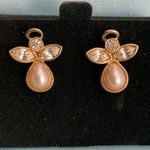 Vintage gold trimmed angel earrings. Pearl and clear crystals make up body. Photo 0