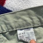 Pastel green high waisted mom shorts with pockets Tagged a size 9/10 28” Photo 2