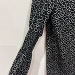 Black & Beige Scallop Co Photo 6