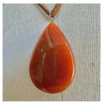 Carnelian teardrop pendant necklace on brown cord Orange Photo 1