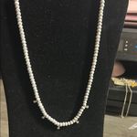 Marbled Beaded Stand of Necklace Beads. Small gemstone accents White Photo 0