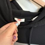 Levi's  Women Black Hoodie Silver Glitter Logo Spellout Slight Cropped Sweatshirt Photo 1