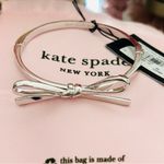 Kate Spade  Silver Bow Bangle NWT Photo 2