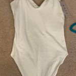 small white body suit Photo 0