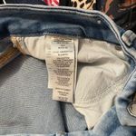 Good American  Good Waist Skinny Cropped Chewed Hem Jeans Photo 3