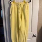 Nike Yellow Women’s Fleece Joggers Photo 0