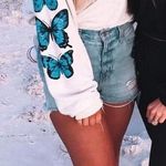 These Three Boutique Butterfly Sleeve Sweatshirt Photo 0