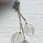 Silver belly bottom charm with leaves Photo 0