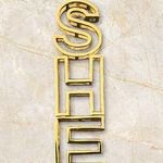 SHE Gold Tone Pendant Necklace Keychain Photo 0