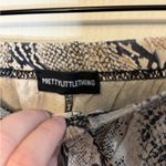 Pretty Little Thing Beige and Black Snakeskin Flare Pants Photo 2