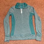 Reva quarter zip running long sleeve shirt with thumbholes & small zipper pocket Photo 0