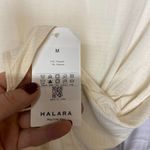 Halara NWT Top MEDIUM Babys Breath Sheer Asymmetrical Slit Casual Relaxed Modern Photo 2