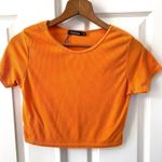 Boohoo cropped orange short sleeved top Photo 1