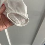 Free People  large rayon gauzy flowy Elegant off scoop White Button-Up Top Photo 4