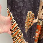 Deep Exports, featuring black background with orange and white circular patterns Size L Photo 5