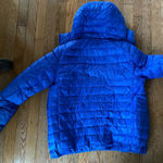 Vibrant Blue Hooded Puffer Jacket Photo 3