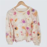 Candace Cameron Bure Pressed Floral Graphic Long Sleeve Tee Natural XS New QVC As Seen On TV Details Fabrication: knit Features: pressed floral graphic print, long blouson sleeves with gathered shirring at rib Photo 1