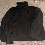 Andrea Jovine  turtleneck sweater Photo 0