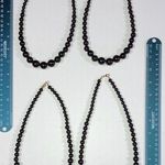 Lot of 4 black bead necklaces Photo 0