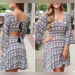 Blush Boutique black and white backless tassel dress size small Photo 1