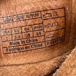 UGG Women's Hyland Black Tassel Leather Moccasin Boots Size 7 Photo 8