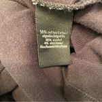 Calvin Klein Jeans|| Black short sleeve v-neck long top with gathered sides. Photo 6