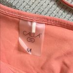 Calia Coral Racerback active dress pockets with attached shorts, size medium Orange Photo 10