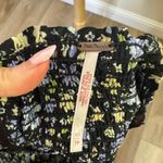 Free People  Molly Jo Midi Dress in a black floral print Photo 5