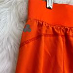 Tek Gear  orange athletic shorts Photo 4