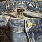 American Eagle  Outfitters Distressed Flare Jeans in Blue Photo 3