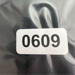 Adidas , athletic mini shorts, women’s size small, logo graphic Photo 4