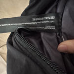 Free People  Bulls Eye Sling Bag. Color black. MSRP $40  Photo 13