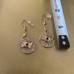 Gold Tone Dangle Earrings with Black Evil Eye Design, Pierced Hook Backing Photo 2