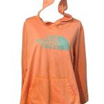 The North Face Neon Orange With Teal Logo Graphic Size XL Hooded Sweatshirt. Photo 0