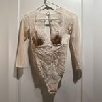 Victoria's Secret Victoria’s Secret Cream lace long sleeve bodysuit with back cutout Size 32C Photo 0