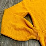 Women’s mustard dark gold high low oversized knit sweater size small Photo 1