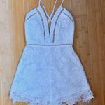 Revolve by the way. Rory Lace Romper in White Photo 5