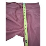 Vuori  Women’s Daily high rise leggings in Spice rust color Size Medium Photo 6