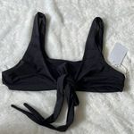 Good American New Women’s ways to wear front tie bikini top in black size Medium Photo 0