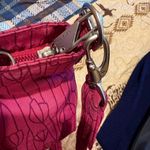 Travelon Anti-Theft Classic Mini Shoulder Bag in the Berry Tulip color Photo 11