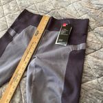 Under Armour  athletic Compression Leggings Medium Size Gray & purple crop NEW Photo 1