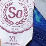 SO  brand cute water colors design with black crisscross in back sports bra! Photo 2