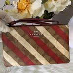 Coach Stripped Red and White Wristlet NWOT Photo 0