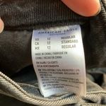 American Eagle  black ripped jean shorts size 12 Photo 1