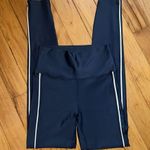 Peloton  Navy Blue Show Up Tuxedo Stripe Leggings Photo 1